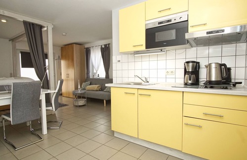 Wiek Apartamento | hafennahe 1-Raum-Ferienwohnung mit kleinem Garten - Haus Windland FeWo 24