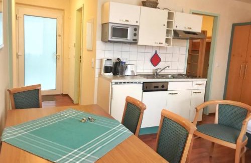 Wiek Apartamento | Hafenresidenz – Ferienwohnung 13 Dahlien