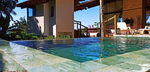 Prumirim Casa | Haleiwa chalés e suítes - A Guest House do Prumirim