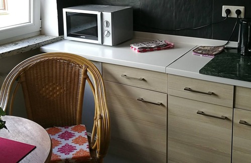 Roedental Apartamento | Hannah vacation apartment with balcony terrace and cozy garden furniture