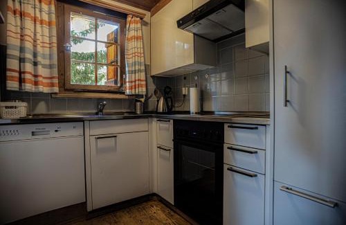 Laax Apartamento | Haus 1 - 4.5 Zimmer Haus in ruhiger Wohngegend mit Garten