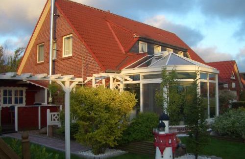 Neuharlingersiel Apartamento | Haus Delphin