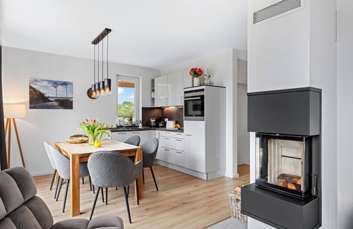 Am Salzhaff Cabaña | Haus Heimathafen with fireplace, sauna and sea view, OFC 35 - Haus Heimathafen with