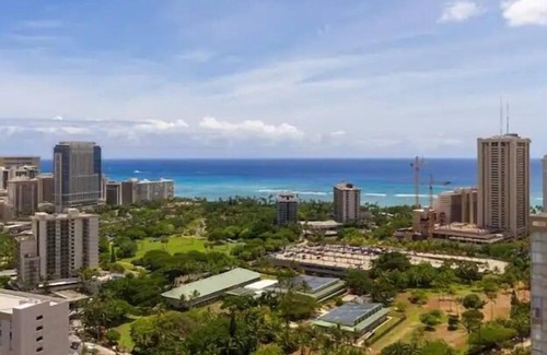 McCully - Moiliili Condominio | Hawaiian Monarch 2703b Condo by RedAwning