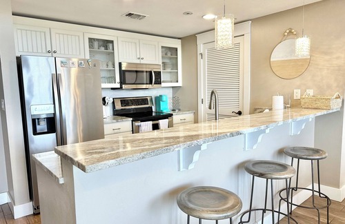 Villa Lago Condominio | Heart of Village of Baytowne Wharf with views of Marina, Fireworks and Concerts!