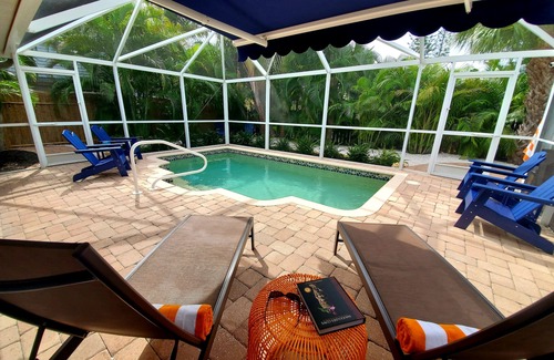 Englewood Casa | Heated Pool, Bikes, Kayaks, Sups, Outdoor Tiki Bar with TV! & Corn Hole Court