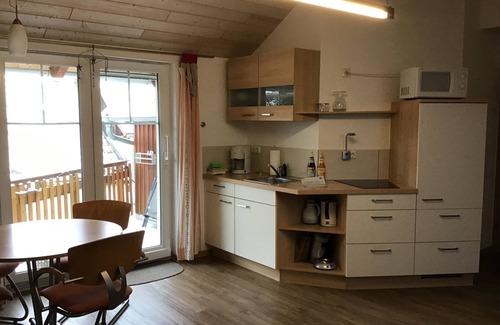Sandberg Apartamento | Helle Ferienwohnung für bis zu Vier Personen mit Südbalkon