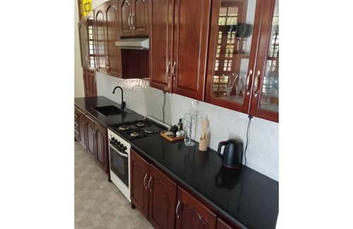 Moshi Cama Y Desayuno | Hellen's Riverside Villas