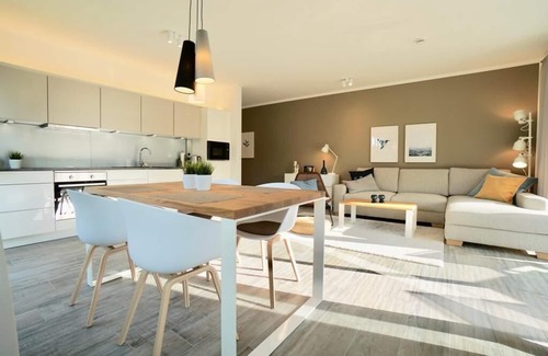 Dangast Apartamento | Este moderno apartamento nórdico premium "Nordbudje" para 4 personas rocía e