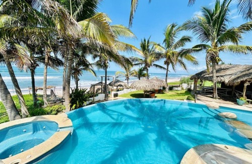 Elota Condominio | Hermosa habitación hotelera frente al mar