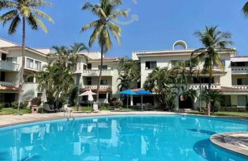 Olas Altas Apartamento | Hermoso apartamento en Manzanillo con alberca y cancha de tenis, Ideal para relajarse y disfrutar de una escapada tranquila en el paraíso tropical