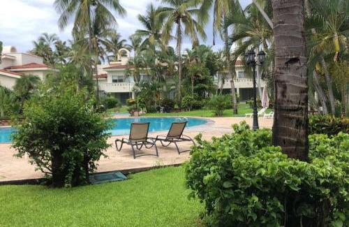 Olas Altas Apartamento | Hermoso apartamento en Manzanillo con alberca y cancha de tenis, Ideal para relajarse y disfrutar de una escapada tranquila en el paraíso tropical