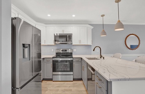 Heron Harbour Isle Condominio | Heron's Nest OC: Newly-renovated, kid friendly, bayside.
