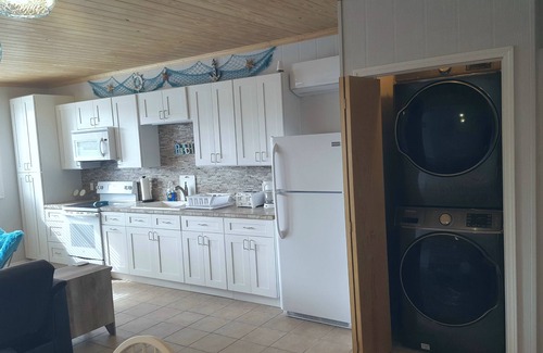 Spanish Wells Apartamento | GEMA OCULTA. Coche de golf gratuito, bicicleta de kayak a bordo 2 min. a pie de playa de pozos españoles