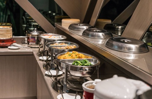 East District Cama Y Desayuno | High Cloud International Business Hotel