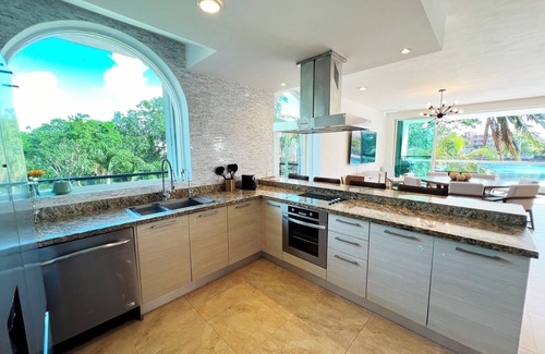 Puerto Aventuras Apartamento | High-End Waterfront Condo Secrets Waters