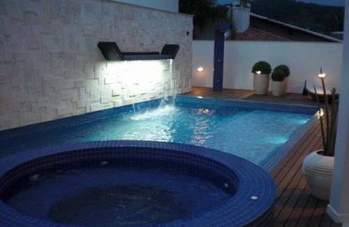 Jurere Internacional Casa | Casa internacional Jurerê de alto nivel - 7 habitaciones - piscina - jacuzzi climatizado
