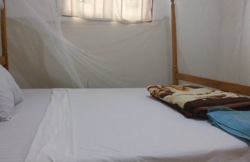 Nebbi Hotel | Highway Motel