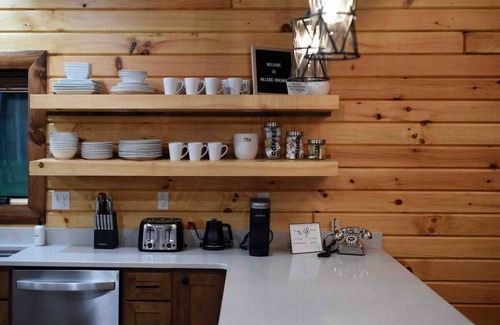 McHenry Cabina | Hillside Hideaway · NEW! Indoor Pool, Hot Tub, Fire Pit, & EV Charger