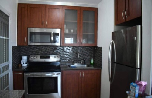 Florencio Casa | Hilltop Getaway with Ocean View, Huge Terrace & Outdoor Kitchen