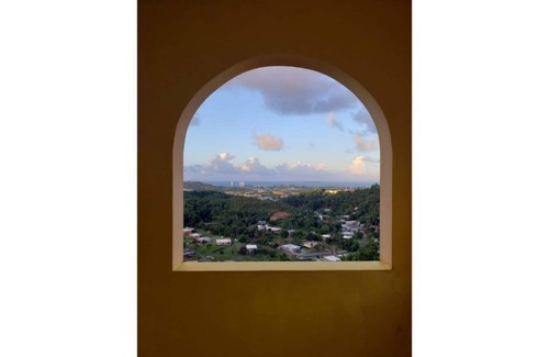 Florencio Casa | Hilltop Getaway with Ocean View, Huge Terrace & Outdoor Kitchen