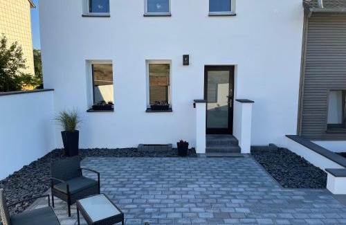 Hunerbach Casa | Hinter'm Mäuerchen