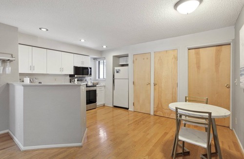 Speer Condominio | Hip Historic Baker Area Condo - Individual Garage Parking Included!