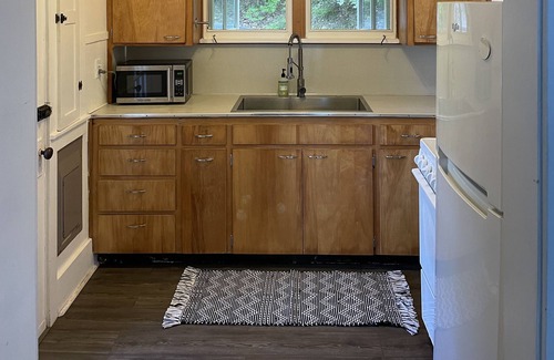 Ludington Cabaña | Historic family cottage on Hamlin Lake w/ complete privacy, surrounded by nature