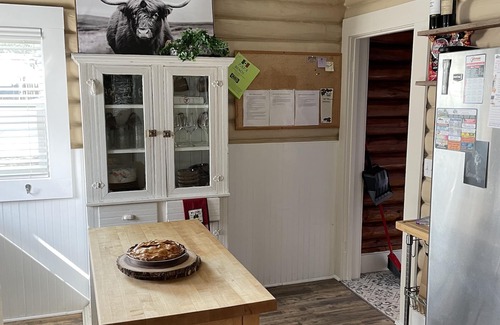 Buffalo Casa | Historic Log Cabin home on Main Street