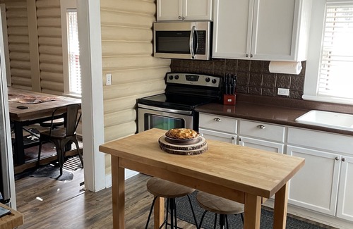 Buffalo Casa | Historic Log Cabin home on Main Street