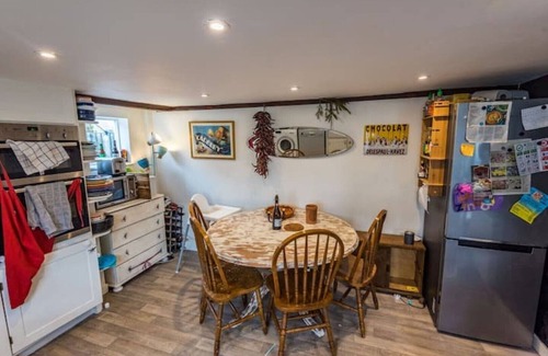 Kessingland Cabaña | Historic seafront cottage, projector, piano etc