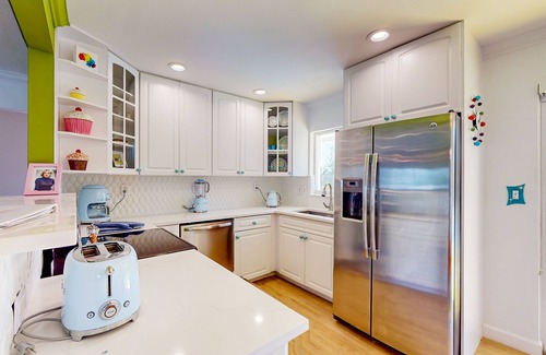 North Corals Casa | Historical bungalow with tropical private salt water pool & outdoor fireplace