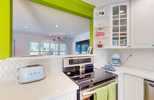 North Corals Casa | Historical bungalow with tropical private salt water pool & outdoor fireplace