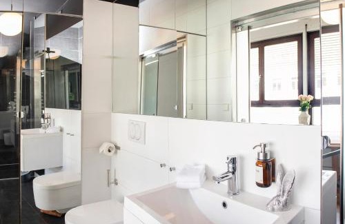 Loerrach Apartamento | Historisches Stellwerk mit Garten in bester Innenstadtlage & Boxspringbetten nahe der Schweizer Grenze