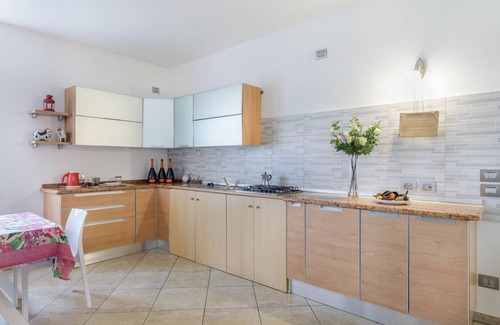 Villafranca di Verona Apartamento | Apartamento vacacional "La Siesta" con jardín compartido, balcón y Wi-Fi