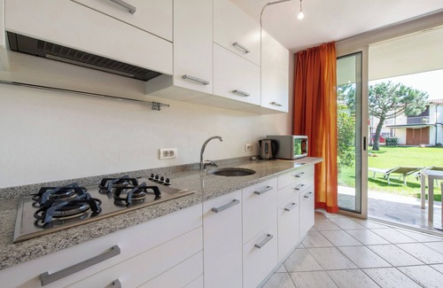 Pieve Vecchia Apartamento | Apartamento vacacional 'Lago Blu' con vistas al lago, terraza y jardín compartido