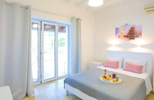 Agios Stefanos Apartamento | Apartamento de vacaciones Agios Georgios para 1 - 7 personas con 2 dormitorios - Apartamento
