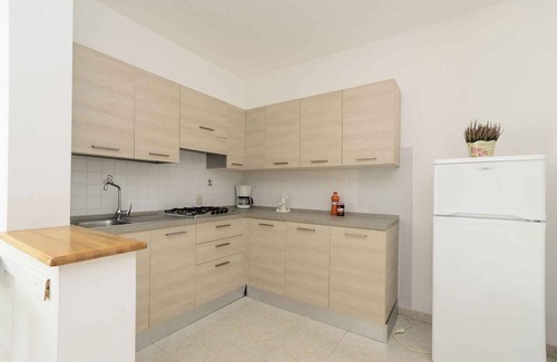 Lignano Riviera Apartamento | Apartamento vacacional 200 m del mar Adriático con parcela ajardinada