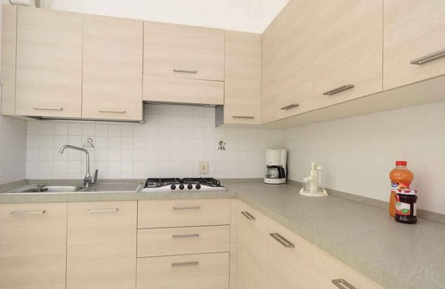 Lignano Riviera Apartamento | Apartamento vacacional 200 m del mar Adriático con parcela ajardinada