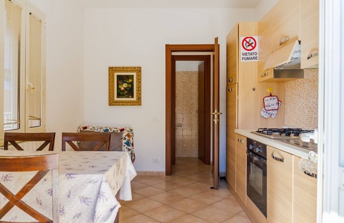 Follonica Apartamento | Apartamento vacacional "Acqua" con vistas al mar y jardín privado