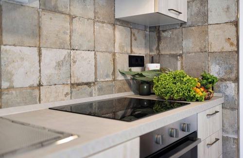 Andora Apartamento | Apartamento vacacional "Antichi Ricordi - La Stalla" con terraza, piscina compartida y Wi-Fi