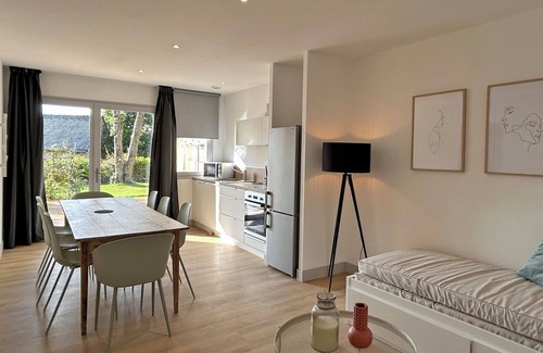 Hillion Apartamento | Apartamento vacacional "Au Colombier" con terraza privada y jardín compartido