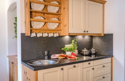Chieming Apartamento | Apartamento vacacional "Beim Paulfischer - Eckbankerl" Cerca de Chiemsee con balcón y terraza