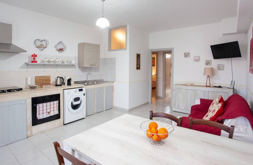 Galtelli Apartamento | Apartamento vacacional "Casa Samuel" con terraza compartida, aire acondicionado y Wi-Fi