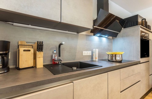 Auffach Apartamento | Apartamento vacacional 'Dorfblick' con vistas a la montaña, jardín compartido y Wi-Fi