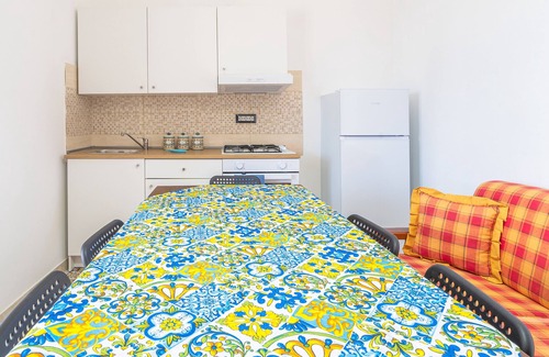 Granelli Apartamento | Apartamento vacacional "La Nassa" con vistas al mar, terraza privada y jardín compartido