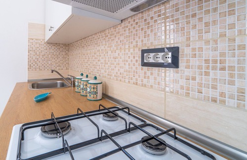 Granelli Apartamento | Apartamento vacacional "La Nassa" con vistas al mar, terraza privada y jardín compartido