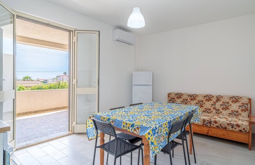 Granelli Apartamento | Apartamento vacacional "La Tonnara" con vistas al mar, terraza privada y aire acondicionado