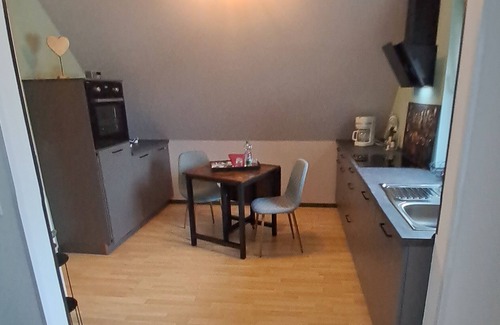 Bad Laer Apartamento | Apartamento 'Ferienwohnung Landquartier' con jardín compartido, balcón y Wi-Fi