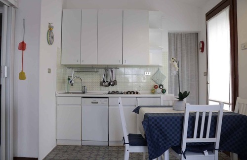 Calmasino Apartamento | Apartamento vacacional con jardín privado y aire acondicionado